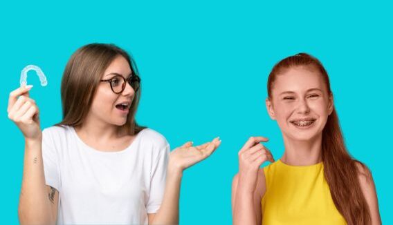 Invisalign vs Braces in Montgomery: Which Is Right for You? Girl holding Invisalign and another girl smiling with braces.